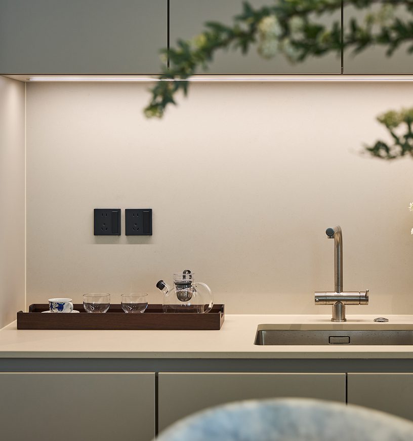 Minimalist kitchen setup with glass teapot