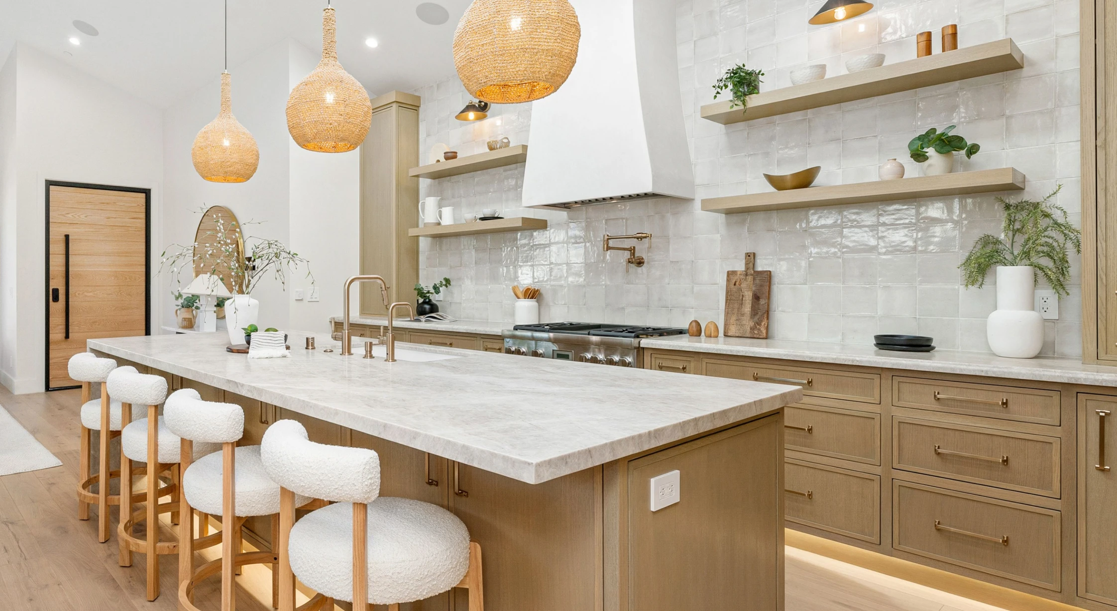 Bright kitchen featuring hanging lights