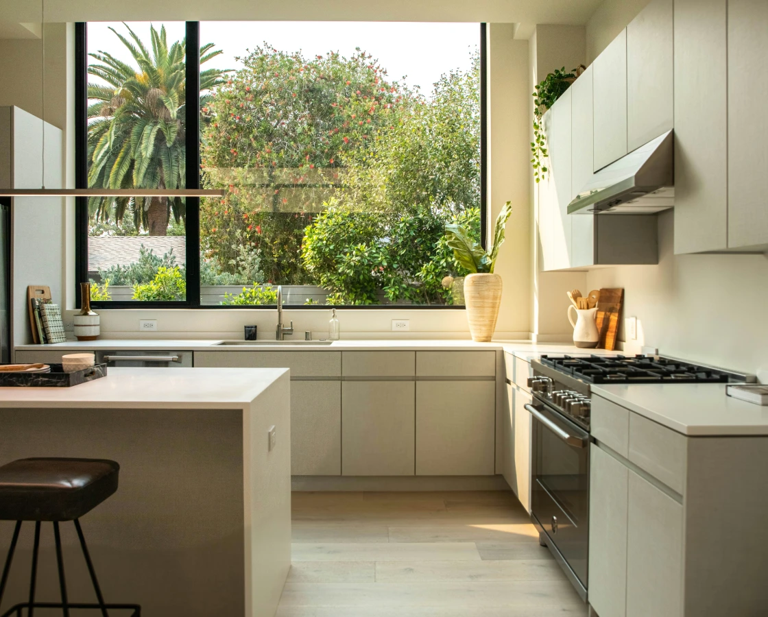 Modern kitchen with island and garden view
